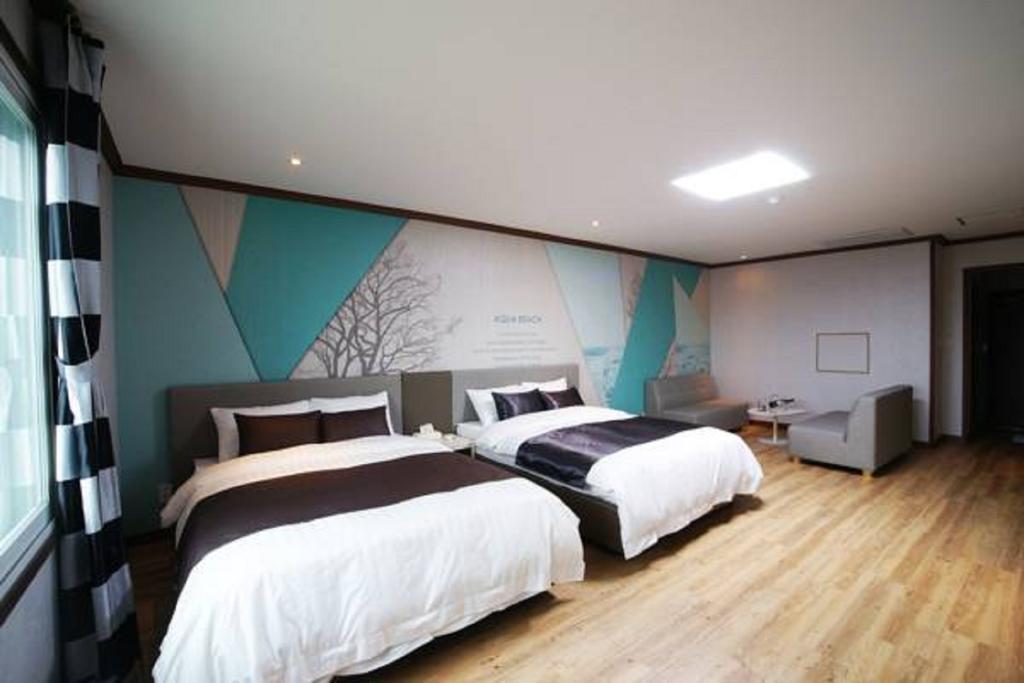 Seongsan Aqua Beach Hotel Seogwipo Zimmer foto