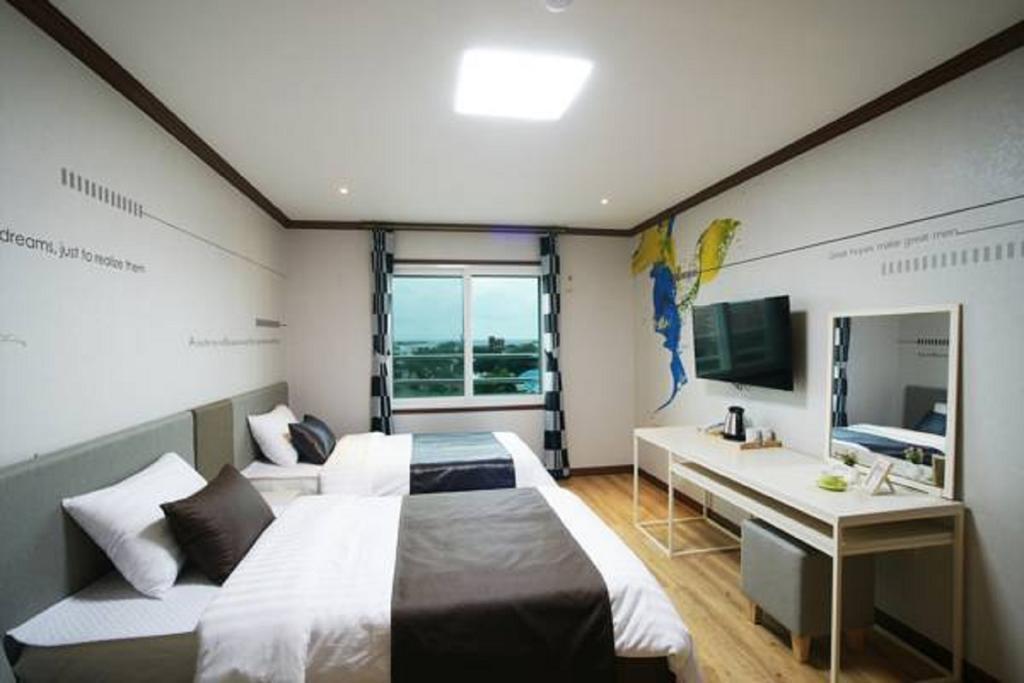 Seongsan Aqua Beach Hotel Seogwipo Zimmer foto