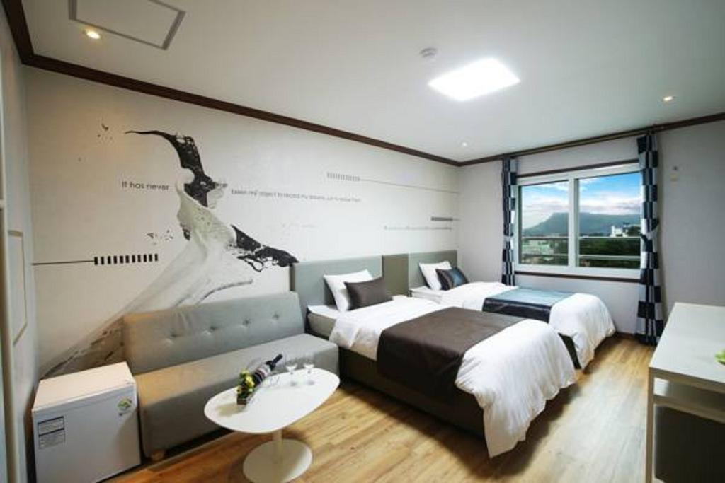 Seongsan Aqua Beach Hotel Seogwipo Zimmer foto