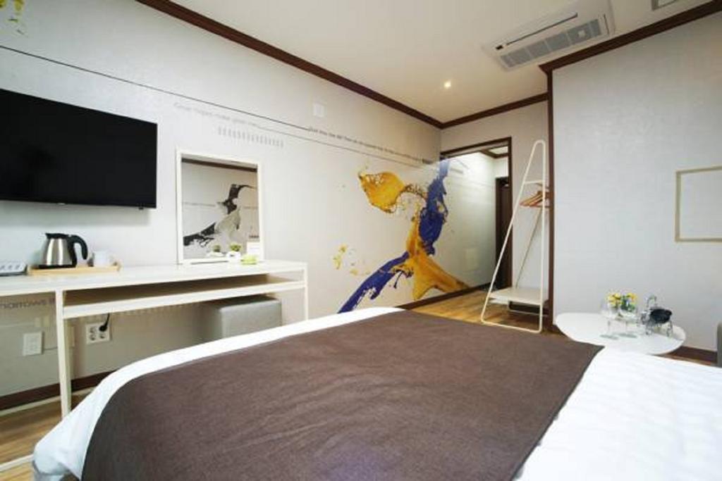 Seongsan Aqua Beach Hotel Seogwipo Zimmer foto
