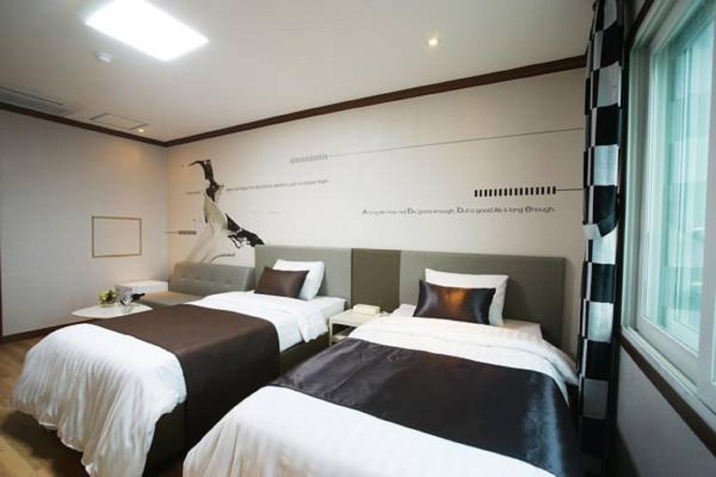 Seongsan Aqua Beach Hotel Seogwipo Zimmer foto